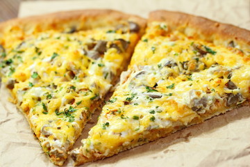 Pizza with chicken meat and mushrooms