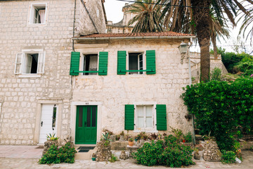 Fototapeta na wymiar The house with orange tiled roof. Houses in Croatia and Montenegro.