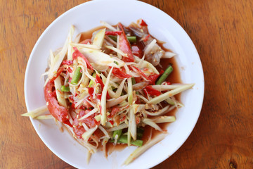 Papaya salad or SOMTUM in Thai Foods.
