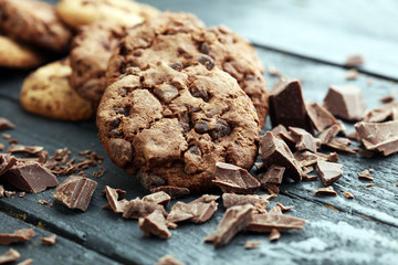 Chocolate cookies on wooden table. Chocolate chip cookies shot