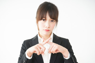 NGサインをする若いビジネスウーマン