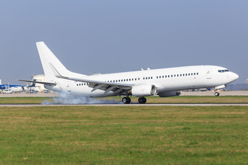 Fototapeta na wymiar White Boeing at Stuttgart Airport 