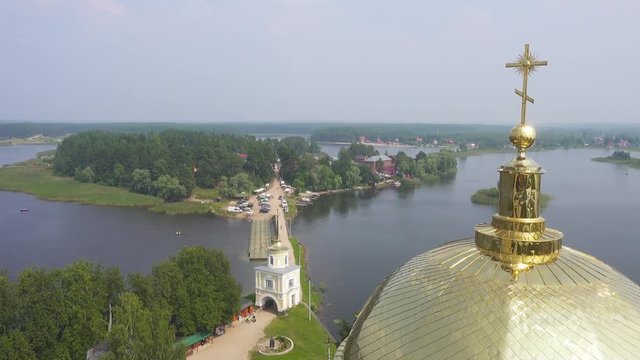 Aerial view on Nilo-Stolobensky (Nil) deserts - Orthodox monastery and the lake Seliger, Tver region, Russia, pan view 4k
