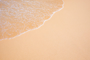 Fototapeta na wymiar Wave on the sand beach background.