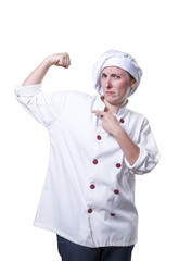 Strong young woman chef with her arm up