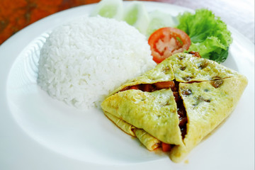 Stuffed omelet with rice