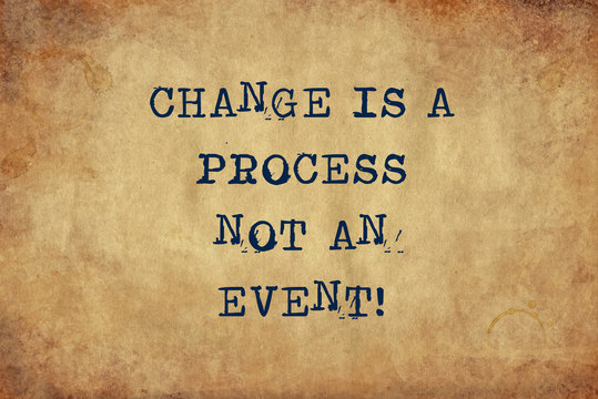 Inspiring motivation quote of change is a process not an event with typewriter text. Distressed Old Paper with Typing image.