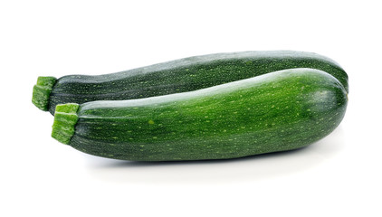 green zucchini vegetables isolated on white
