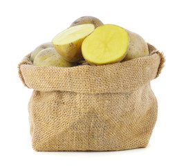 potatoes in sack isolated on white background.