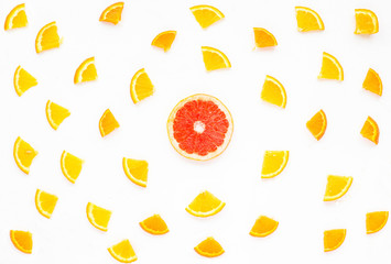 Fruit composition. Fresh colorful citrus fruits on white background. Flat lay, mock up, top view