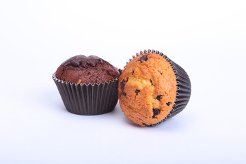 Fresh homemade muffins on white background. Top view.