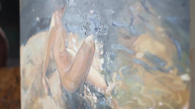 Naked girl on pebble beach. panoramic shot of the picture painted with oil paint. close-up. a picture of a woman sitting on the stones. Large mask. the style of painting realism.