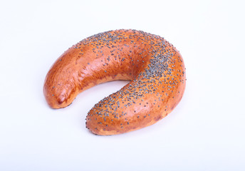 Assorted fresh breads isolated on a white background.