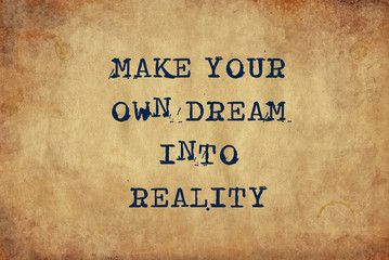 Inspiring motivation quote of make your own dream into reality with typewriter text. Distressed Old Paper with Typing image.