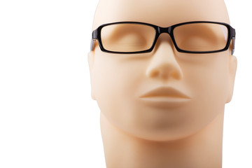 dummy head with black eyeglasses