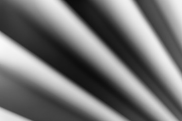 Abstract background in the form of dark black and white waves