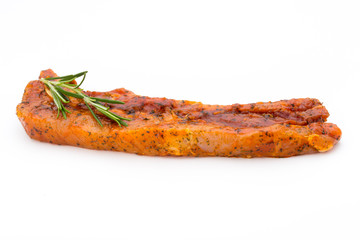 Spicy marinated spare ribs barbecued on the white background.