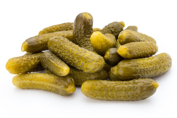 Marinated pickled cucumbers isolated on the white.