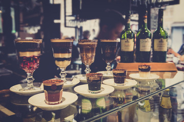 Glasses with a coffee cocktail on the bar counter in Madrid, Spain