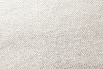 closeup of white woven texture with selective focus 