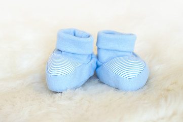Waiting baby, baby shower. Blue newborn shoes