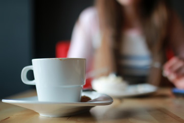 girl in a cafe for a cup of coffee with the notebook