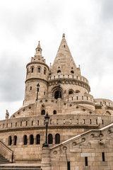 Tower of the Fisherman's bastion in Buda castle on a cloudy day, Budapest, Hungary