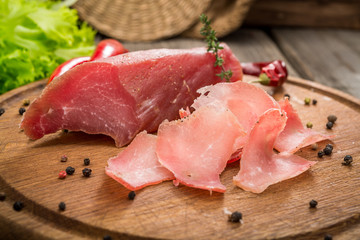 beef jerky and spice on old table