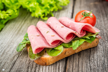 sandwich with ham and vegetables