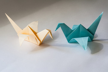 Colored paper cranes origami