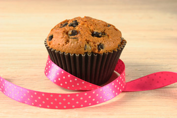 Chocolate muffins on the table. Holiday Decorations