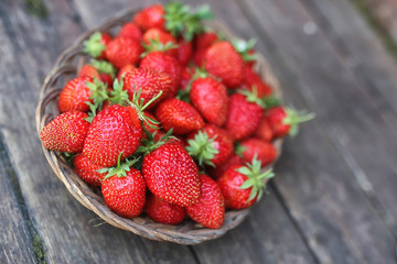 Strawberry on rustic wooden background