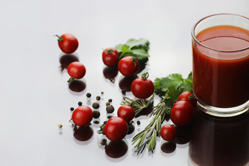 glass of tomato juice drops