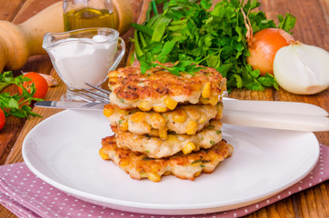 Chicken fritters with corn, onions and fresh herbs