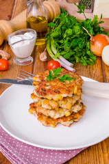 Chicken fritters with corn, onions and fresh herbs