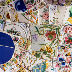 Broken glass mosaic tile, decoration in Park Guell, Barcelona, Spain.