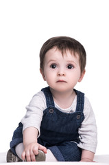 portrait of adorable baby girl with big eyes, isolated on white. happy family concept