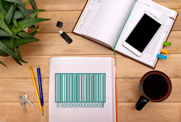 Notes barcode product  in the Notepad on the Desk of a businessman.