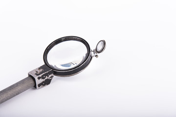 Double magnifying glass on a white background, expert tools