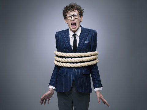 Business Man Tied Up With Rope