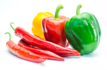 Colorful peppers on a white background.