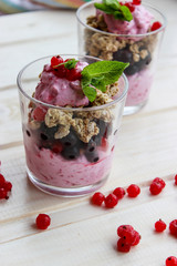 healthy Breakfast of cottage cheese , currants and roasted oat flakes