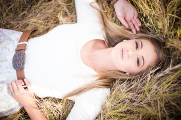 Beautiful teen model on a farm with an old house