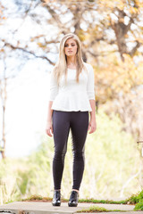 Beautiful teen model on a farm with an old house