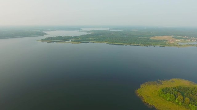 Summer aerial landscape of Seliger lake in Russia at evening, 4k
