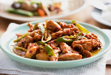 stir fried chicken with chili paste in plate,thai food