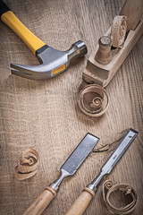 hammer planner chissels shavings on wood