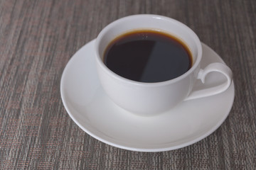 Cup of coffee on the table.