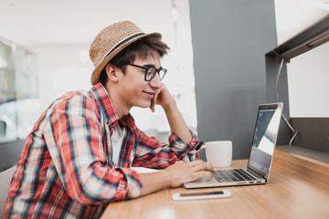 Boy looking at a laptop