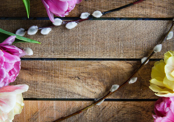 Easter wooden background with flowers  and willow 9